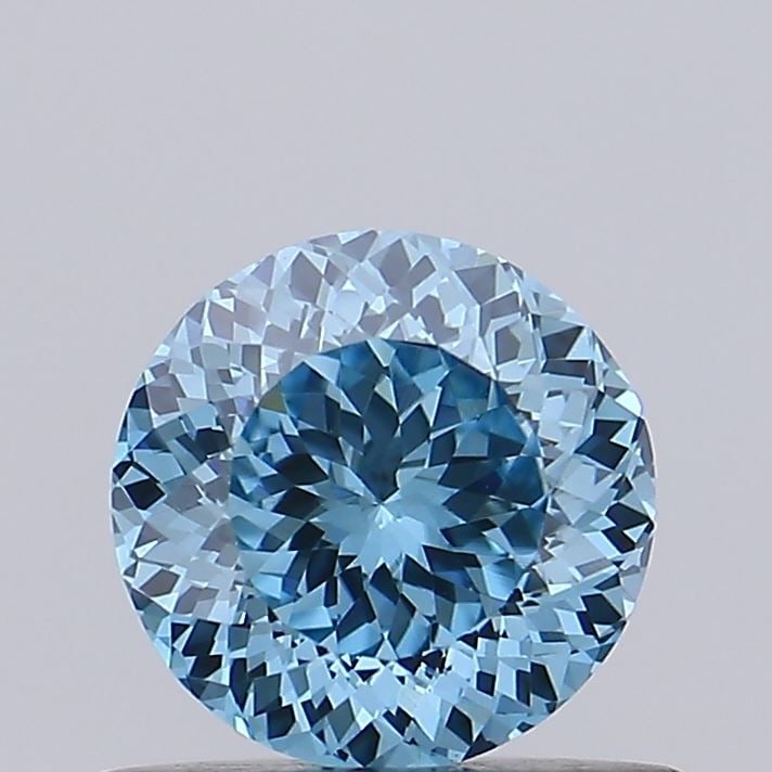 Loose Diamond - ROUND 0.6ct Fancy Vivid Blue VVS2: Loose Diamond - ROUND 0.6ct Fancy Vivid Blue VVS2 Source: This is a real non-mined Diamond that has been grown in a lab Shape: ROUND Carats: 0.6 Color: Fancy Vivid Blue Certification: IGI Video: