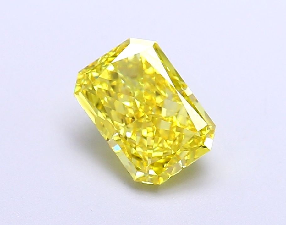 Loose Diamond - RADIANT 1.56ct Fancy Vivid Yellow VS1: Loose Diamond - RADIANT 1.56ct Fancy Vivid Yellow VS1 Source: This is a real non-mined Diamond that has been grown in a lab Shape: RADIANT Carats: 1.56 Color: Fancy Vivid Yellow Certification: IGI Vid