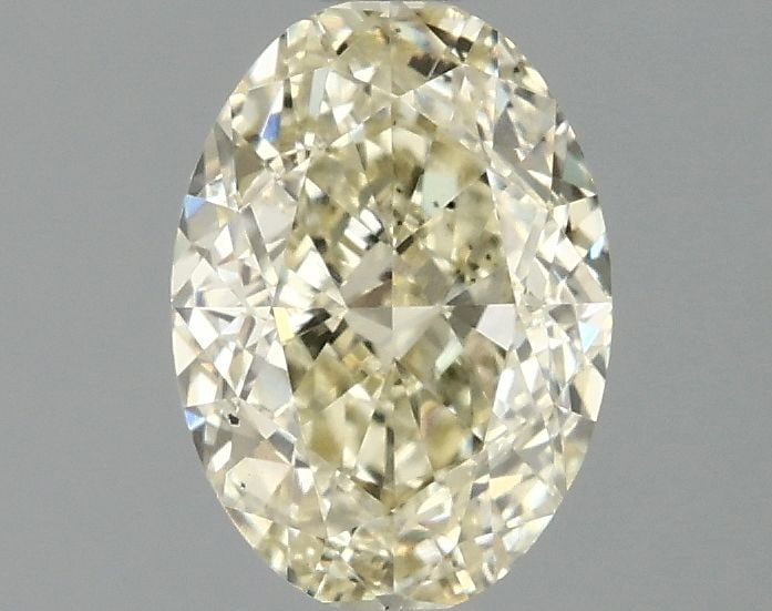 Loose Diamond - OVAL 1.53ct Fancy Yellow SI1: Loose Diamond - OVAL 1.53ct Fancy Yellow SI1 Source: This is a real non-mined Diamond that has been grown in a lab Shape: OVAL Carats: 1.53 Color: Fancy Yellow Certification: IGI Video: