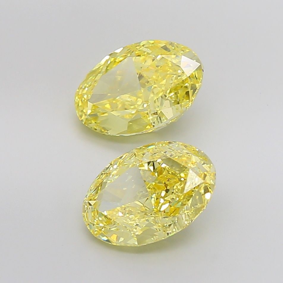 Loose Diamond - OVAL 4.07ct Fancy Vivid Yellow VS1: Loose Diamond - OVAL 4.07ct Fancy Vivid Yellow VS1 Source: This is a real non-mined Diamond that has been grown in a lab Shape: OVAL Carats: 4.07 Color: Fancy Vivid Yellow Certification: IGI Video: