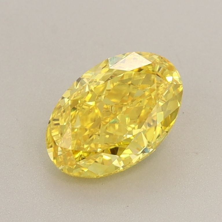 Loose Diamond - OVAL 1.04ct Fancy Vivid Yellow VS1: Loose Diamond - OVAL 1.04ct Fancy Vivid Yellow VS1 Source: This is a real non-mined Diamond that has been grown in a lab Shape: OVAL Carats: 1.04 Color: Fancy Vivid Yellow Certification: IGI Video: