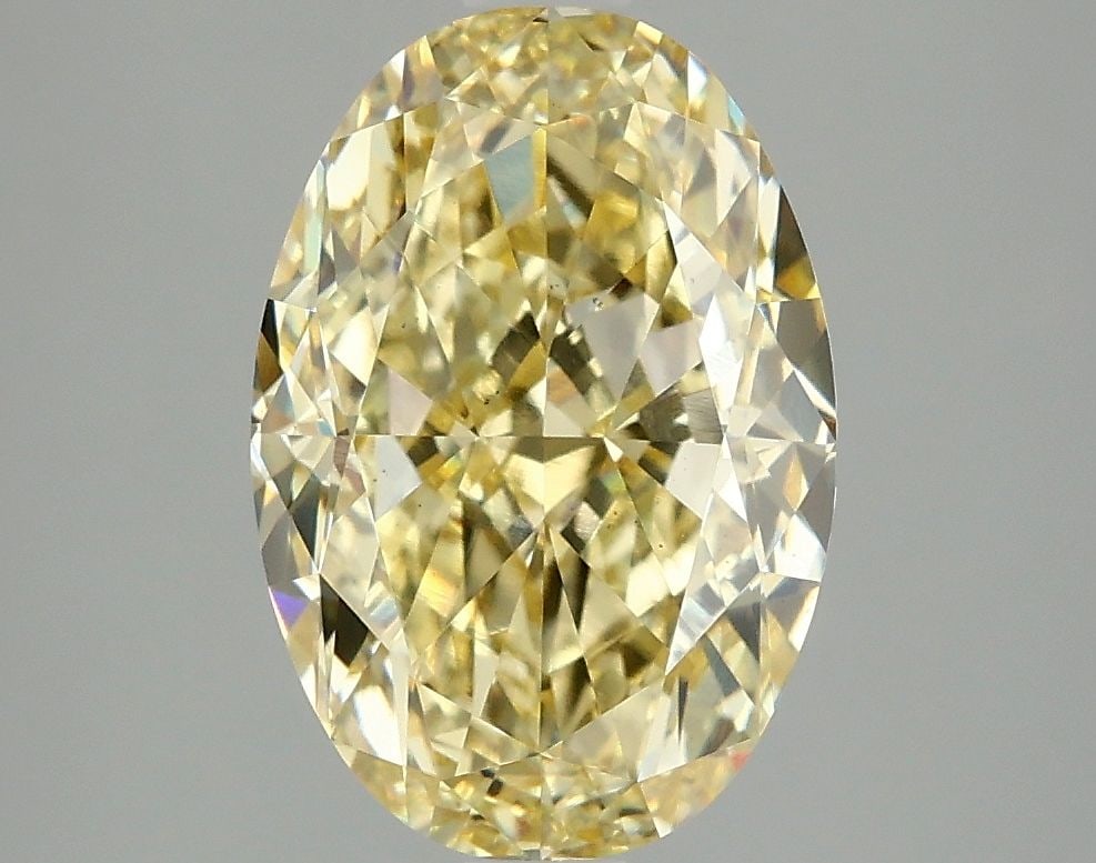 Loose Diamond - OVAL 4.04ct Fancy Intense Yellow VS1: Loose Diamond - OVAL 4.04ct Fancy Intense Yellow VS1 Source: This is a real non-mined Diamond that has been grown in a lab Shape: OVAL Carats: 4.04 Color: Fancy Intense Yellow Certification: IGI Video