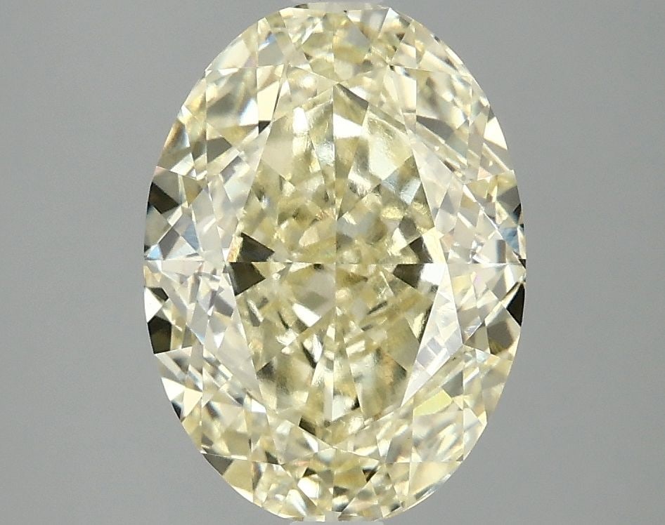 Loose Diamond - OVAL 4.0ct Fancy Yellow VVS2: Loose Diamond - OVAL 4.0ct Fancy Yellow VVS2 Source: This is a real non-mined Diamond that has been grown in a lab Shape: OVAL Carats: 4.0 Color: Fancy Yellow Certification: IGI Video: