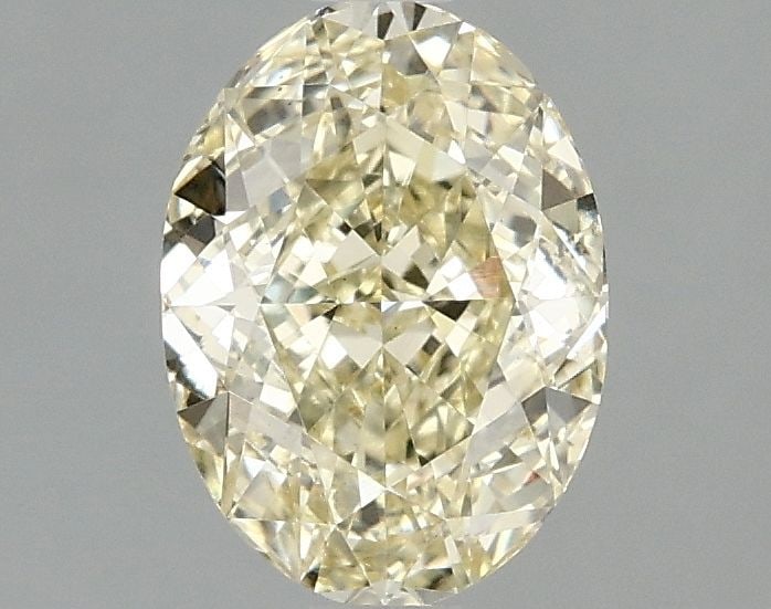 Loose Diamond - OVAL 1.5ct Fancy Yellow VS1: Loose Diamond - OVAL 1.5ct Fancy Yellow VS1 Source: This is a real non-mined Diamond that has been grown in a lab Shape: OVAL Carats: 1.5 Color: Fancy Yellow Certification: IGI Video: