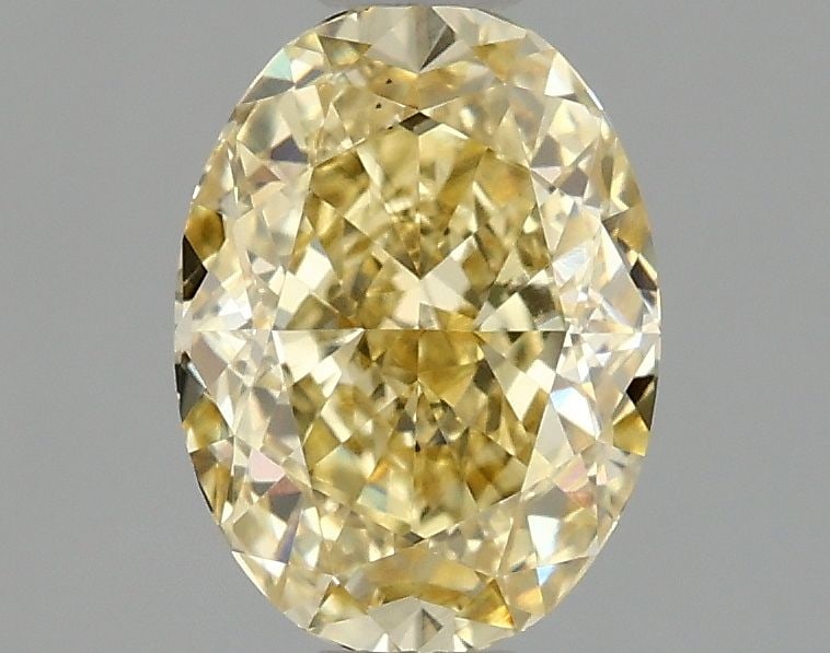 Loose Diamond - OVAL 1.08ct Fancy Intense Yellow VS1: Loose Diamond - OVAL 1.08ct Fancy Intense Yellow VS1 Source: This is a real non-mined Diamond that has been grown in a lab Shape: OVAL Carats: 1.08 Color: Fancy Intense Yellow Certification: IGI Video