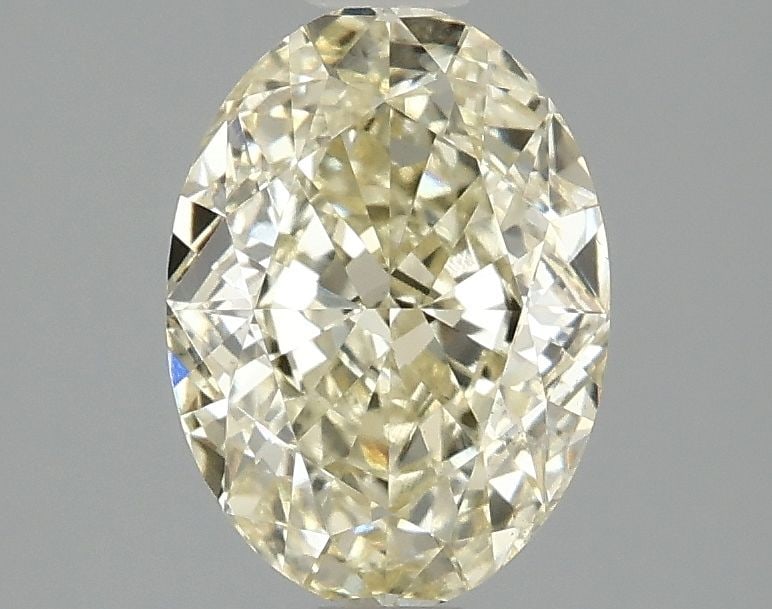 Loose Diamond - OVAL 2.05ct Fancy Yellow VS1: Loose Diamond - OVAL 2.05ct Fancy Yellow VS1 Source: This is a real non-mined Diamond that has been grown in a lab Shape: OVAL Carats: 2.05 Color: Fancy Yellow Certification: IGI Video: