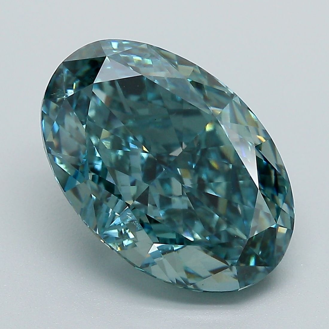 Loose Diamond - OVAL 6.07ct Fancy Vivid Blue Green VS1: Loose Diamond - OVAL 6.07ct Fancy Vivid Blue Green VS1 Source: This is a real non-mined Diamond that has been grown in a lab Shape: OVAL Carats: 6.07 Color: Fancy Vivid Blue Green Certification: IGI V