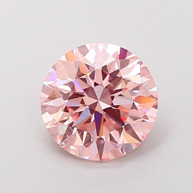 Loose Diamond - ROUND 2.0ct Fancy Vivid Pink VVS2: Loose Diamond - ROUND 2.0ct Fancy Vivid Pink VVS2 Source: This is a real non-mined Diamond that has been grown in a lab Shape: ROUND Carats: 2.0 Color: Fancy Vivid Pink Certification: IGI Video: