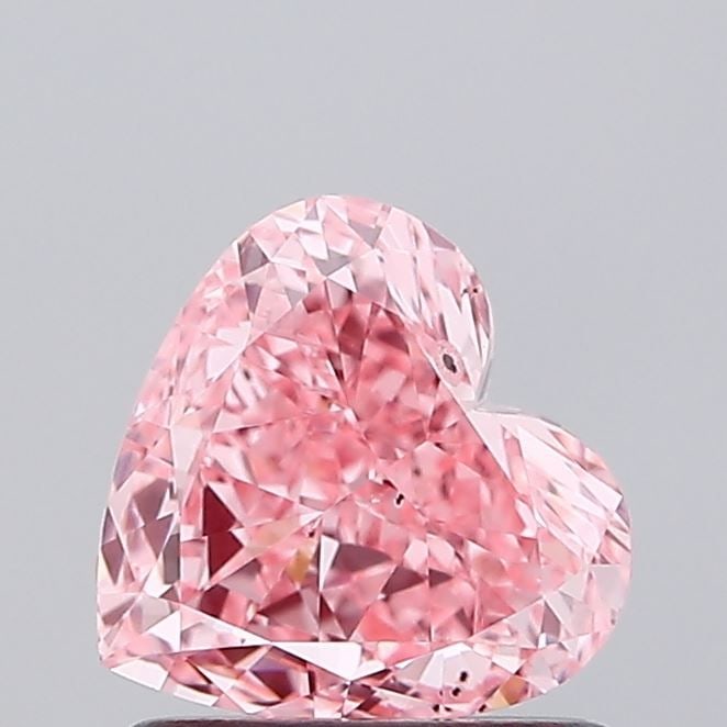 Loose Diamond - HEART 1.04ct Fancy Vivid Pink SI1: Loose Diamond - HEART 1.04ct Fancy Vivid Pink SI1 Source: This is a real non-mined Diamond that has been grown in a lab Shape: HEART Carats: 1.04 Color: Fancy Vivid Pink Certification: IGI Video: