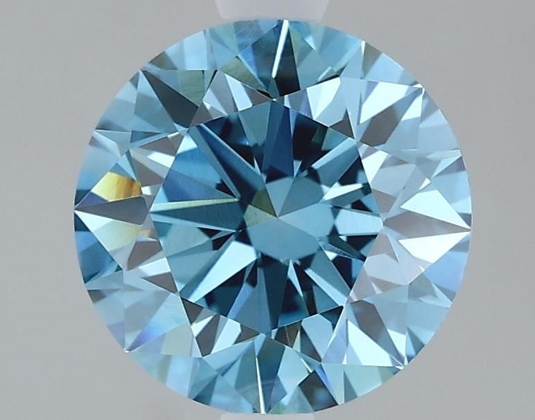 Ideal Loose Diamond - ROUND 2.09ct Fancy Vivid Blue VVS2: Ideal Loose Diamond - ROUND 2.09ct Fancy Vivid Blue VVS2 Source: This is a real non-mined Diamond that has been grown in a lab Shape: ROUND Carats: 2.09 Color: Fancy Vivid Blue Certification: IGI Vide