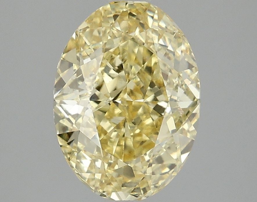 Loose Diamond - OVAL 3.05ct Fancy Vivid Yellow VS1: Loose Diamond - OVAL 3.05ct Fancy Vivid Yellow VS1 Source: This is a real non-mined Diamond that has been grown in a lab Shape: OVAL Carats: 3.05 Color: Fancy Vivid Yellow Certification: IGI Video: