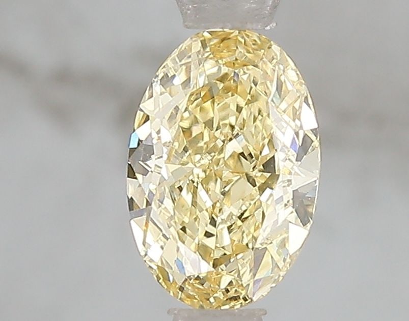 Loose Diamond - OVAL 1.09ct Fancy Intense Yellow VVS2: Loose Diamond - OVAL 1.09ct Fancy Intense Yellow VVS2 Source: This is a real non-mined Diamond that has been grown in a lab Shape: OVAL Carats: 1.09 Color: Fancy Intense Yellow Certification: IGI Vide