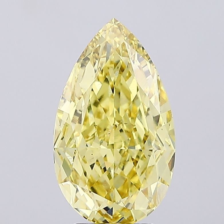 Loose Diamond - PEAR 5.25ct Fancy Vivid Yellow VS2: Loose Diamond - PEAR 5.25ct Fancy Vivid Yellow VS2 Source: This is a real non-mined Diamond that has been grown in a lab Shape: PEAR Carats: 5.25 Color: Fancy Vivid Yellow Certification: IGI Video:
