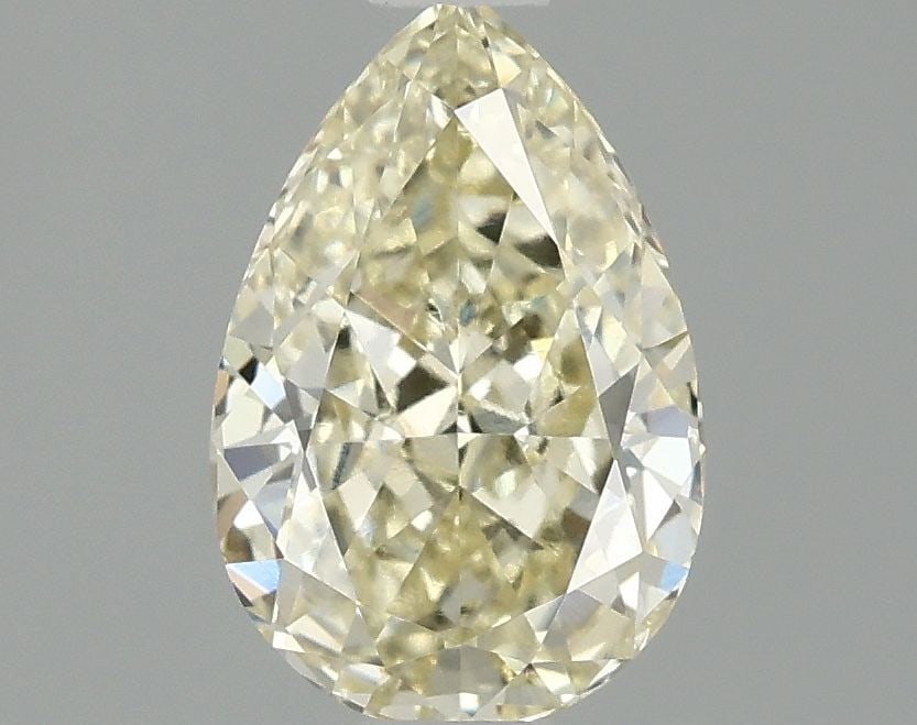 Loose Diamond - PEAR 1.07ct Fancy Yellow VS1: Loose Diamond - PEAR 1.07ct Fancy Yellow VS1 Source: This is a real non-mined Diamond that has been grown in a lab Shape: PEAR Carats: 1.07 Color: Fancy Yellow Certification: IGI Video: