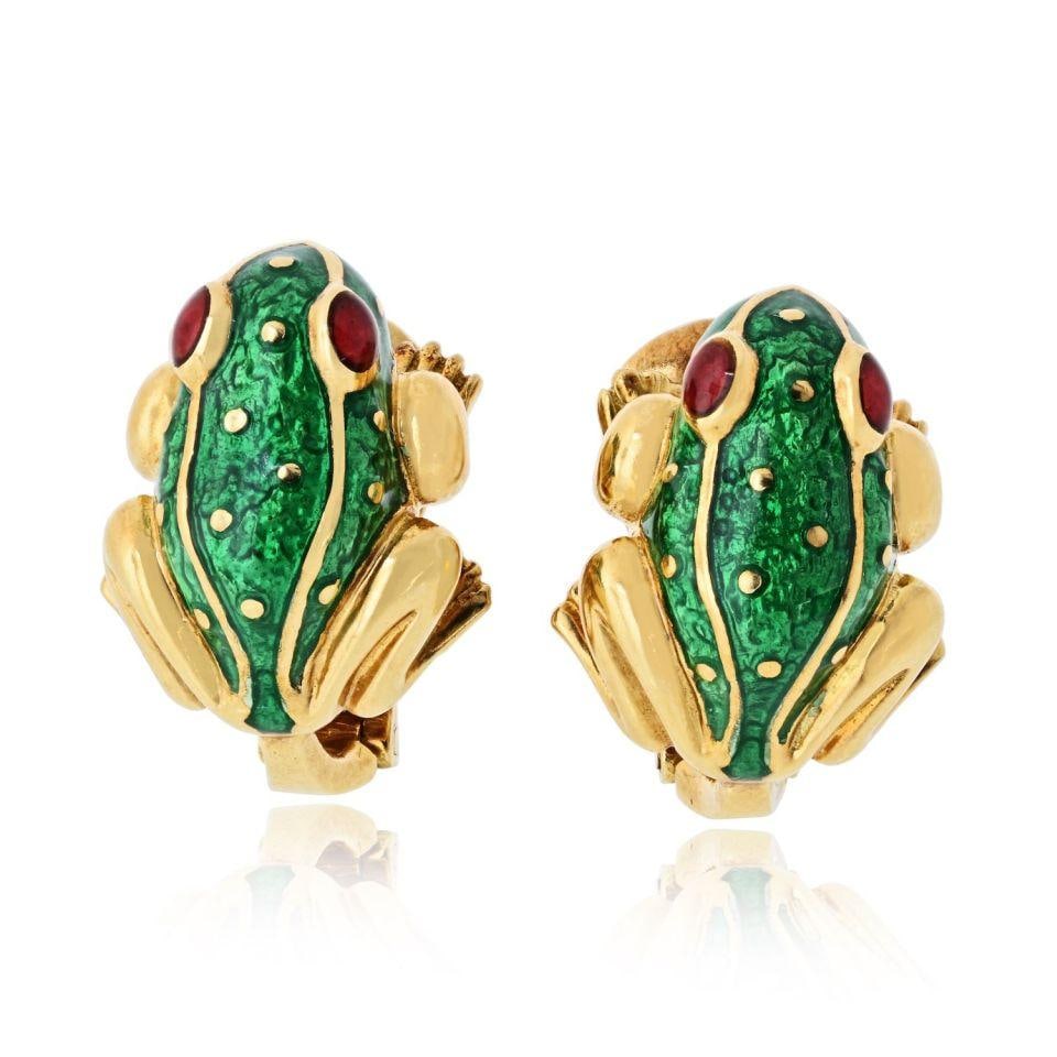 18K Yellow Gold Earrings by David Webb: 18K Yellow Gold Earrings by David Webb These pre-owned David Webb earrings are crafted from 18K yellow gold and feature a clip-on design. They have a total weight of 18.2 grams. Specifications Type: E