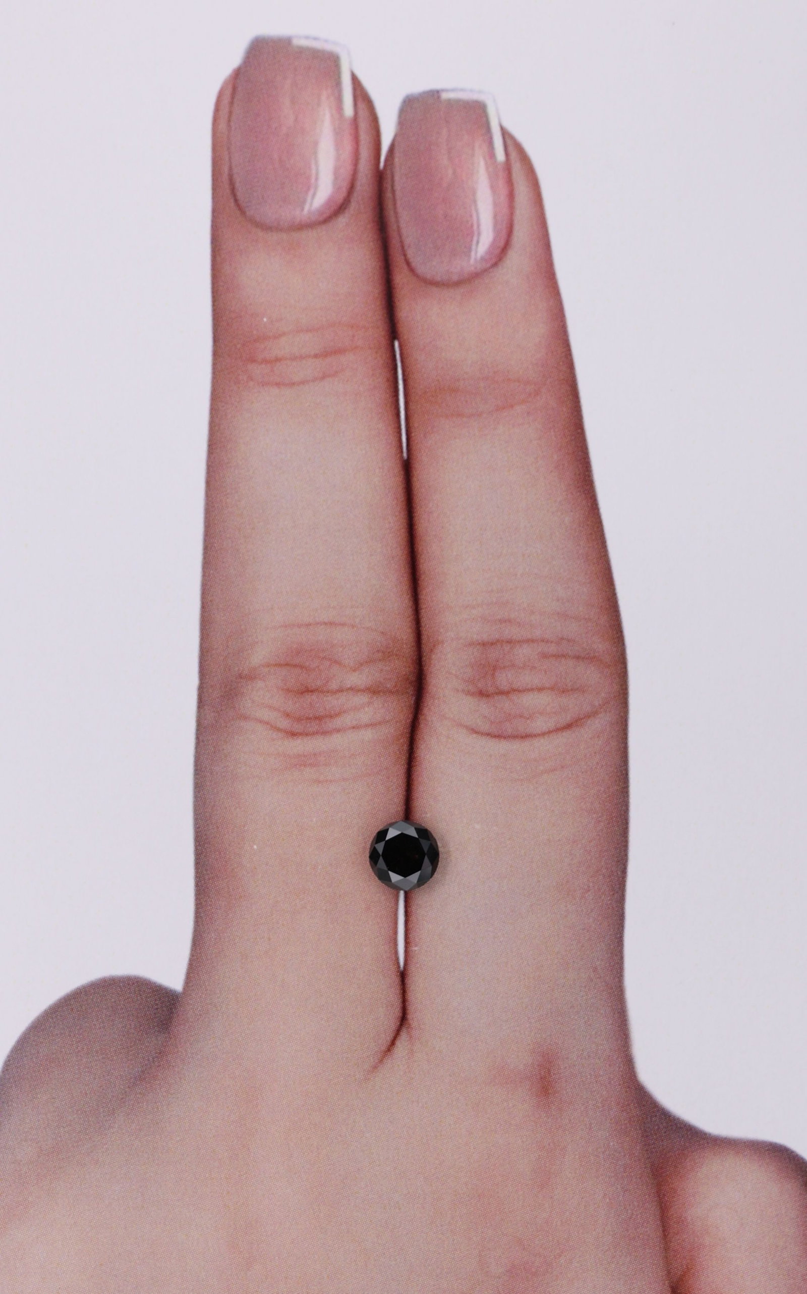Loose Diamond - ROUND 0.55ct Fancy Black VVS2: Loose Diamond - ROUND 0.55ct Fancy Black VVS2 Source: Natural Shape: ROUND Carats: 0.55 Color: Fancy Black Certification: NONE Video: