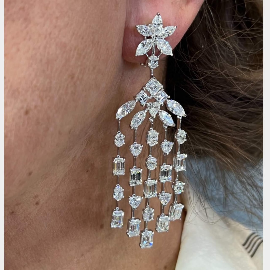 Platinum Diamond Chandelier Earrings 70 Diamonds 23.24 Ct 3 Inches: Platinum Diamond Chandelier Earrings 70 Diamonds 23.24 Ct 3 Inches Elevate your elegance with these stunning Platinum Diamond Chandelier Earrings. Crafted from high-quality platinum, these earrings fe