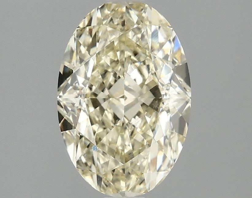 Loose Diamond - OVAL 2.1ct Fancy Vivid Yellow VVS2: Loose Diamond - OVAL 2.1ct Fancy Vivid Yellow VVS2 Source: This is a real non-mined Diamond that has been grown in a lab Shape: OVAL Carats: 2.1 Color: Fancy Vivid Yellow Certification: IGI Video: