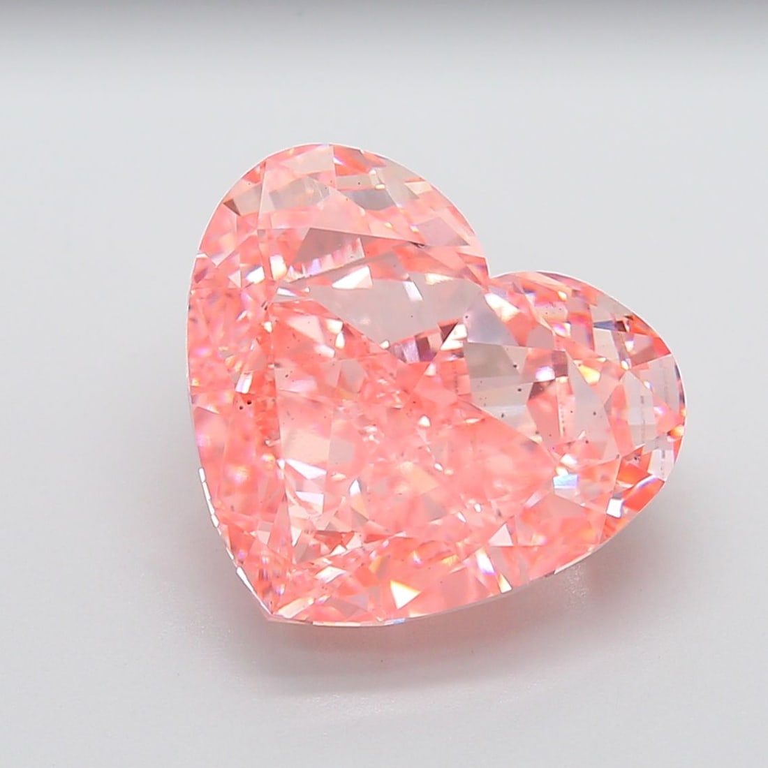 Loose Diamond - HEART 16.37ct Fancy Vivid Pink VS2: Loose Diamond - HEART 16.37ct Fancy Vivid Pink VS2 Source: This is a real non-mined Diamond that has been grown in a lab Shape: HEART Carats: 16.37 Color: Fancy Vivid Pink Certification: IGI The Diamo