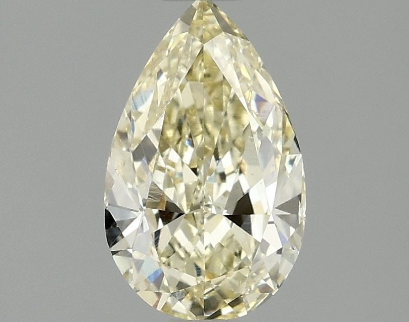 Loose Diamond - PEAR 1.49ct Fancy Yellow VS1: Loose Diamond - PEAR 1.49ct Fancy Yellow VS1 Source: This is a real non-mined Diamond that has been grown in a lab Shape: PEAR Carats: 1.49 Color: Fancy Yellow Certification: IGI Video:
