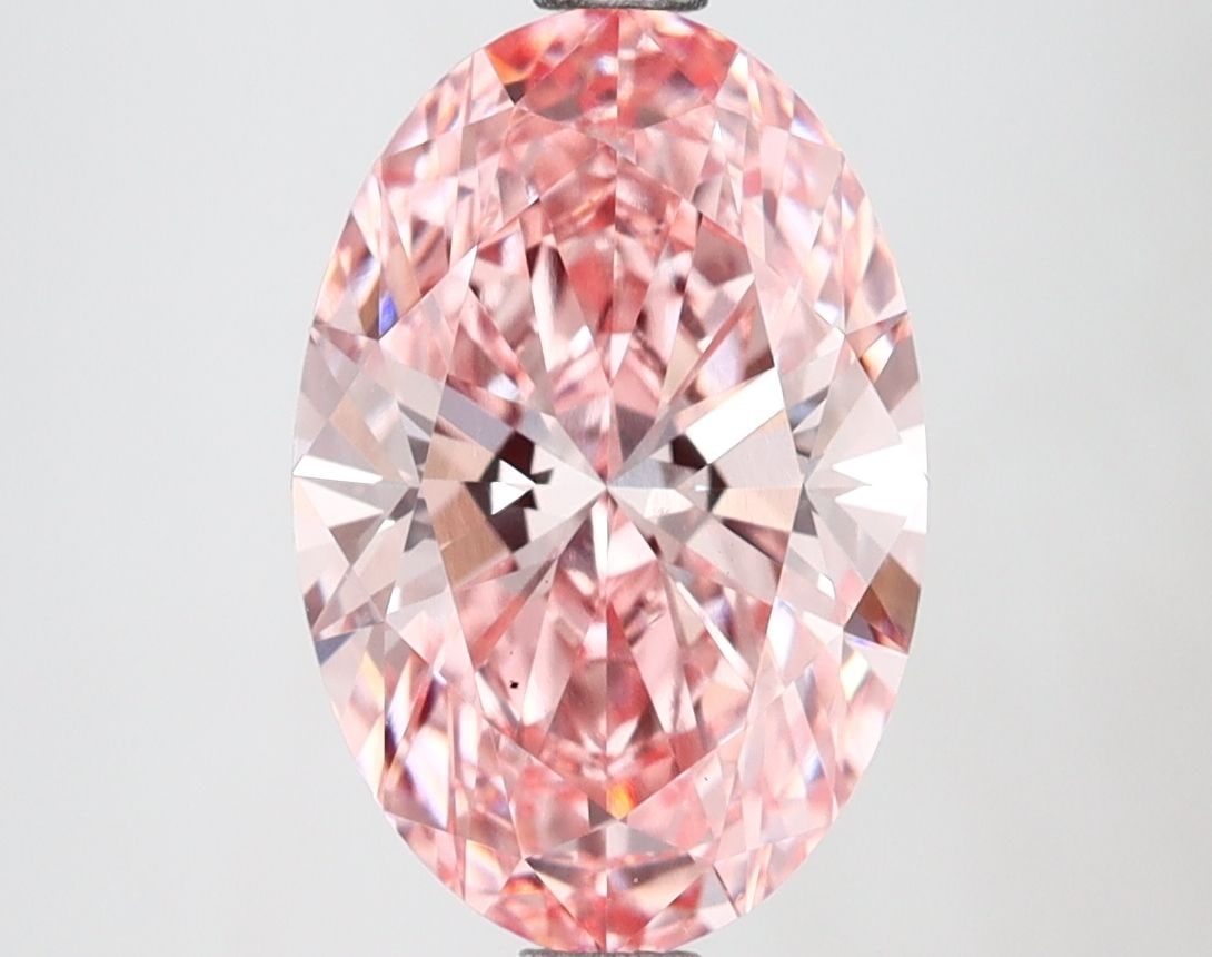 Loose Diamond - OVAL 2.73ct Fancy Vivid Pink VS2: Loose Diamond - OVAL 2.73ct Fancy Vivid Pink VS2 Source: This is a real non-mined Diamond that has been grown in a lab Shape: OVAL Carats: 2.73 Color: Fancy Vivid Pink Certification: IGI Video: