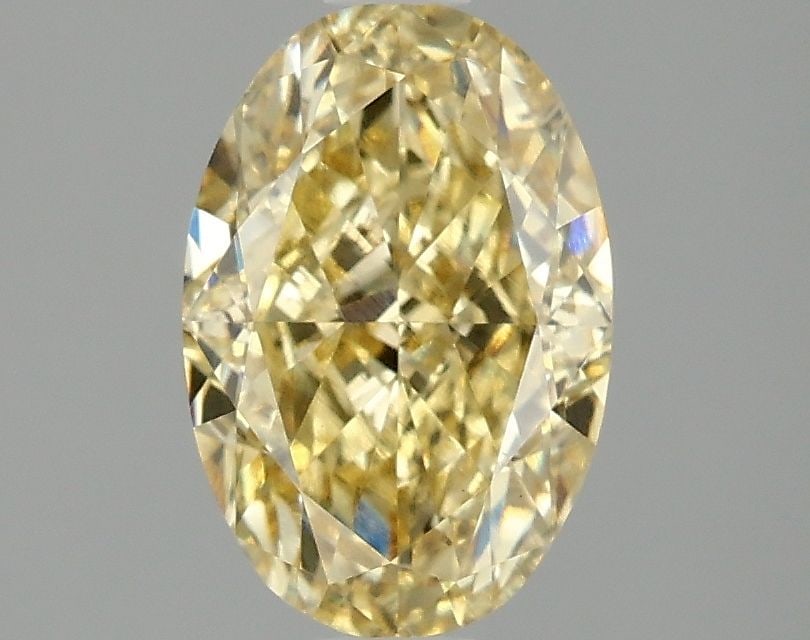 Loose Diamond - OVAL 1.99ct Fancy Intense Yellow VS1: Loose Diamond - OVAL 1.99ct Fancy Intense Yellow VS1 Source: This is a real non-mined Diamond that has been grown in a lab Shape: OVAL Carats: 1.99 Color: Fancy Intense Yellow Certification: IGI Video