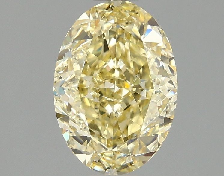 Loose Diamond - OVAL 1.59ct Fancy Intense Yellow VS1: Loose Diamond - OVAL 1.59ct Fancy Intense Yellow VS1 Source: This is a real non-mined Diamond that has been grown in a lab Shape: OVAL Carats: 1.59 Color: Fancy Intense Yellow Certification: IGI Video