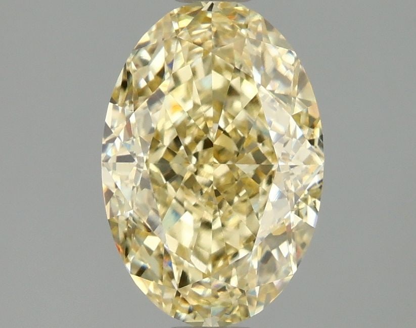 Loose Diamond - OVAL 2.1ct Fancy Intense Yellow VVS2: Loose Diamond - OVAL 2.1ct Fancy Intense Yellow VVS2 Source: This is a real non-mined Diamond that has been grown in a lab Shape: OVAL Carats: 2.1 Color: Fancy Intense Yellow Certification: IGI Video: