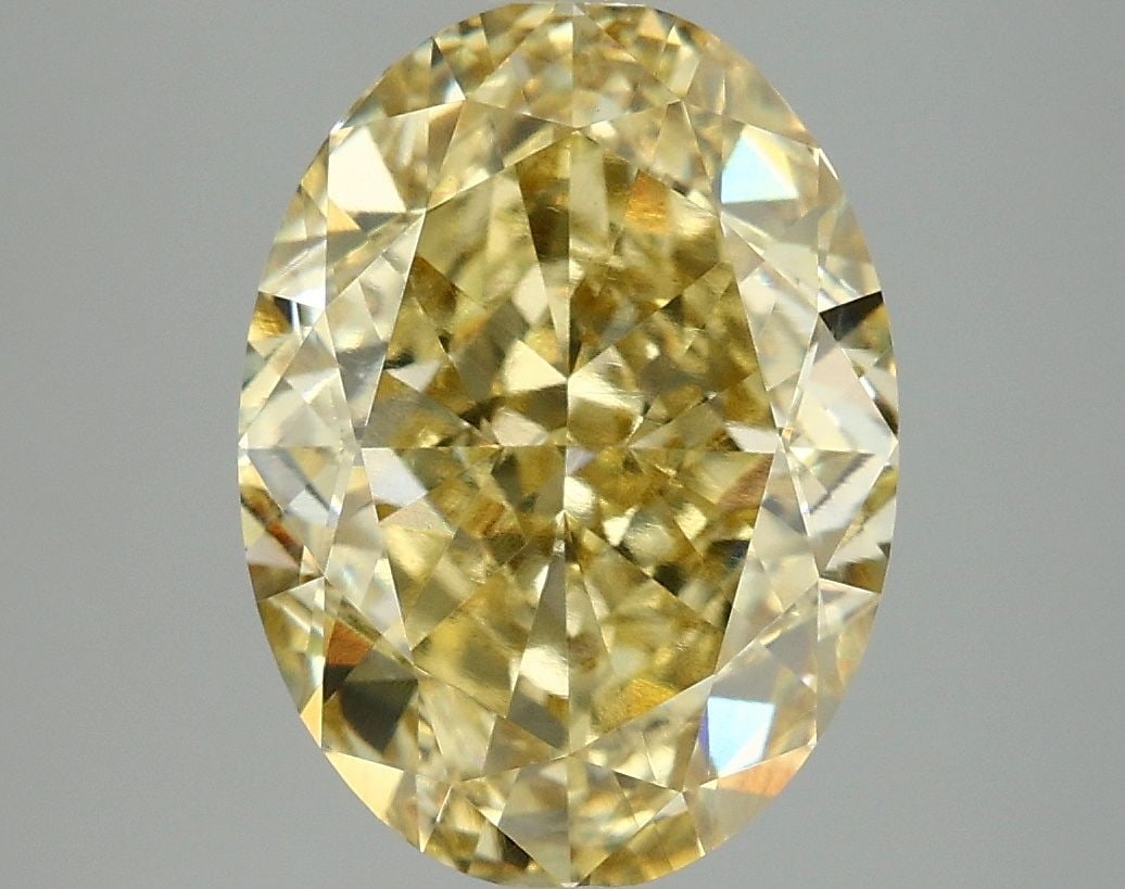 Loose Diamond - OVAL 5.02ct Fancy Intense Yellow VVS2: Loose Diamond - OVAL 5.02ct Fancy Intense Yellow VVS2 Source: This is a real non-mined Diamond that has been grown in a lab Shape: OVAL Carats: 5.02 Color: Fancy Intense Yellow Certification: IGI Vide