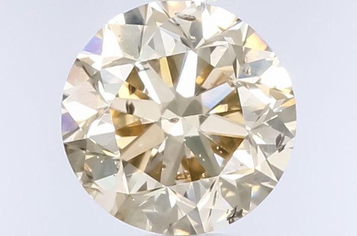 Loose Diamond - ROUND 0.72ct Fancy Light Yellow Brown: Loose Diamond - ROUND 0.72ct Fancy Light Yellow Brown Source: Natural Shape: ROUND Carats: 0.72 Color: Fancy Light Yellow Brown Certification: GIA Video: