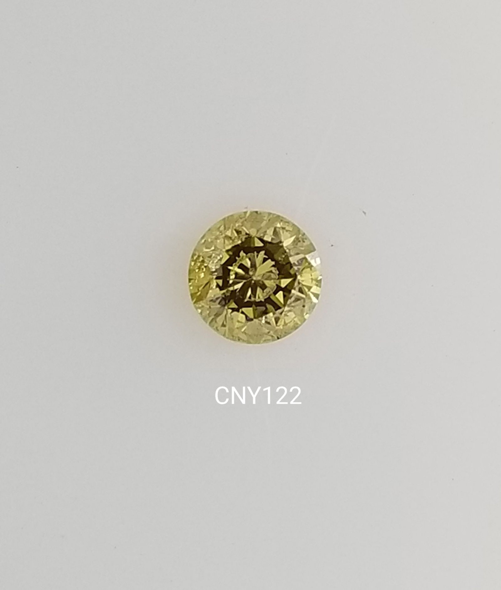 Loose Diamond - ROUND 0.4ct Fancy Yellow: Loose Diamond - ROUND 0.4ct Fancy Yellow Source: Natural Shape: ROUND Carats: 0.4 Color: Fancy Yellow Certification: NONE The Diamond Depot Guarantee: All items in this auction are guaranteed to be 10