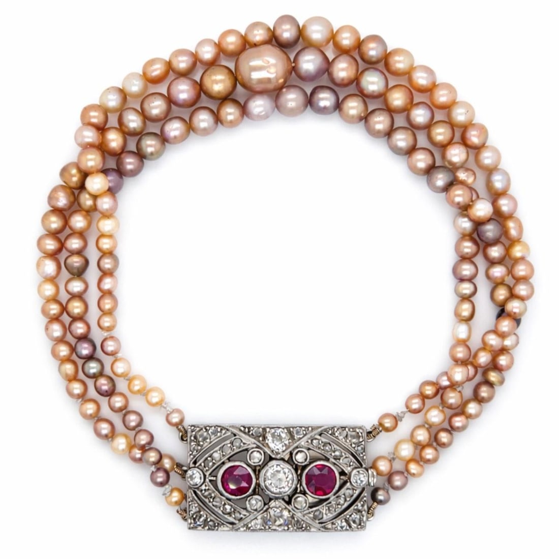 GIA Certified 18K White Gold Art Deco Bracelet with Pearls Diamonds Rubies: GIA Certified 18K White Gold Art Deco Bracelet with Pearls Diamonds Rubies This Art Deco bracelet is crafted in 18K white gold and features 142 GIA certified natural pearls. It is accented with 41 dia