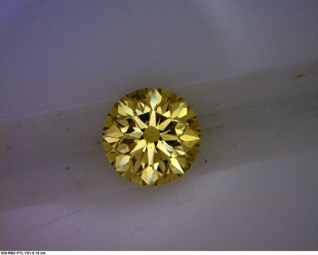 Loose Diamond - ROUND 0.15ct Fancy Yellow: Loose Diamond - ROUND 0.15ct Fancy Yellow Source: Natural Shape: ROUND Carats: 0.15 Color: Fancy Yellow Certification: GIA The Diamond Depot Guarantee: All items in this auction are guaranteed to be 1