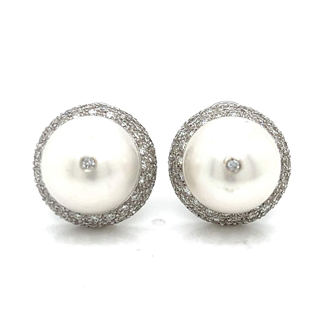 Stunning 18K White Gold South Sea Pearl Diamond Earrings: Stunning 18K White Gold South Sea Pearl Diamond Earrings Elevate your elegance with these stunning 18K White Gold South Sea Pearl and Diamond Earrings. Featuring two exquisite South Sea pearls, each m