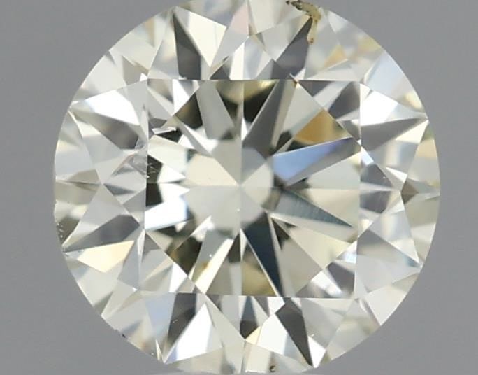 Loose Diamond - ROUND 0.4ct O-P SI1: Loose Diamond - ROUND 0.4ct O-P SI1 Source: Natural Shape: ROUND Carats: 0.4 Color: O-P Certification: IGI Video:
