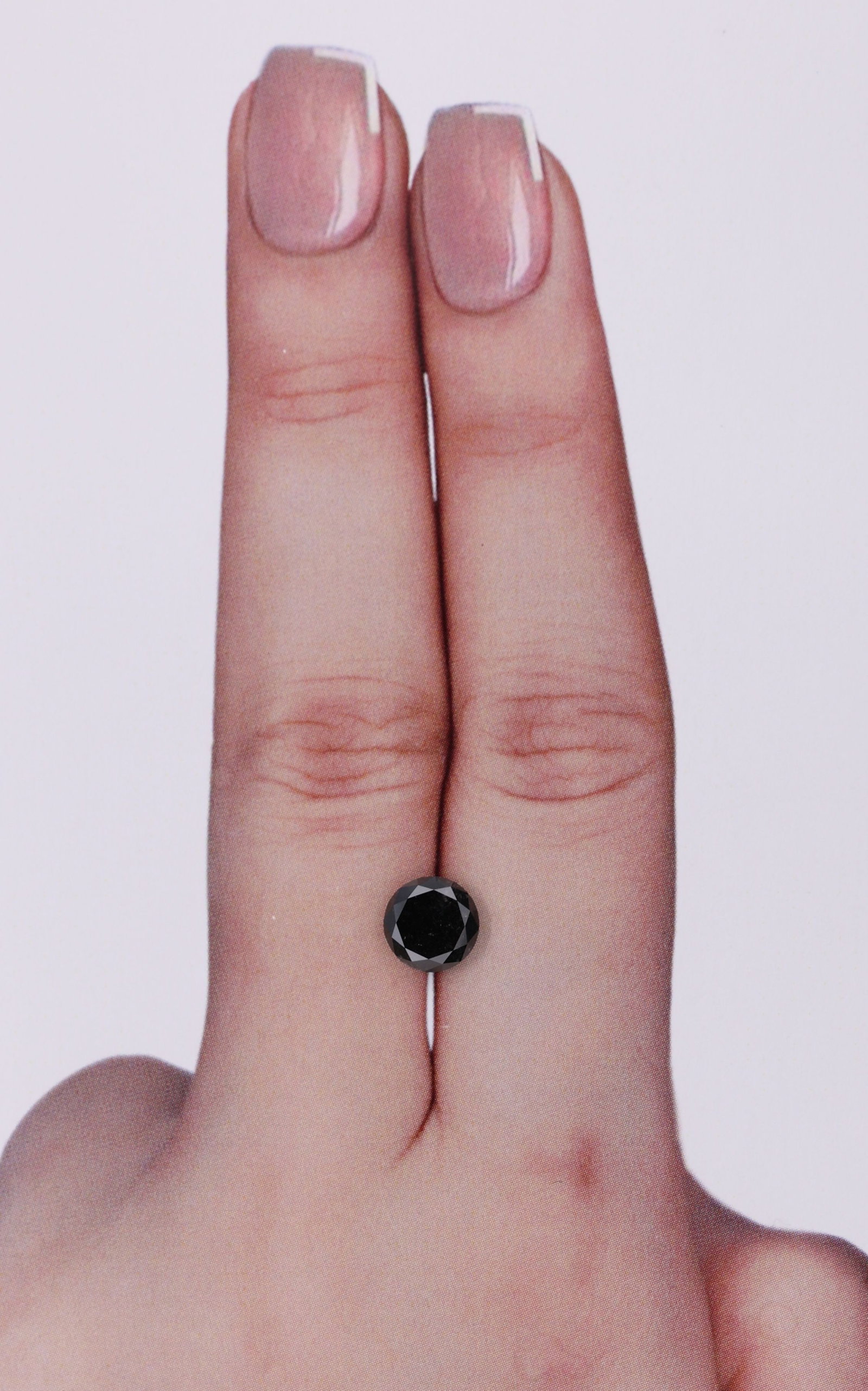 Loose Diamond - ROUND 0.98ct Fancy Black VVS2: Loose Diamond - ROUND 0.98ct Fancy Black VVS2 Source: Natural Shape: ROUND Carats: 0.98 Color: Fancy Black Certification: GIA The Diamond Depot Guarantee: All items in this auction are guaranteed to b