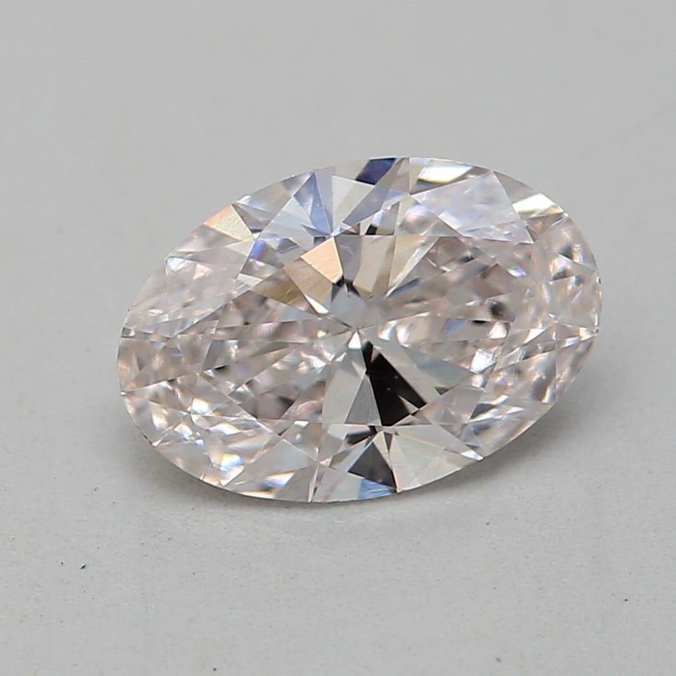 Loose Diamond - OVAL 1.01ct Faint Pink VS2: Loose Diamond - OVAL 1.01ct Faint Pink VS2 Source: Natural Shape: OVAL Carats: 1.01 Color: Faint Pink Certification: GIA The Diamond Depot Guarantee: All items in this auction are guaranteed to be 100
