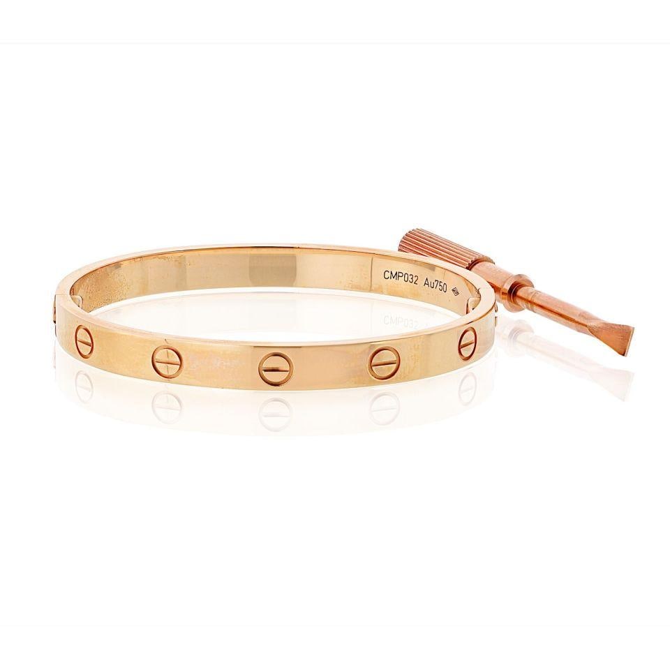 Cartier Love Bracelet 18K Rose Gold Size 16 Pre-Owned: Cartier Love Bracelet 18K Rose Gold Size 16 Pre-Owned This stunning Cartier Love bracelet is crafted from luxurious 18K rose gold and features a stylish design that embodies love and elegance. Weighin