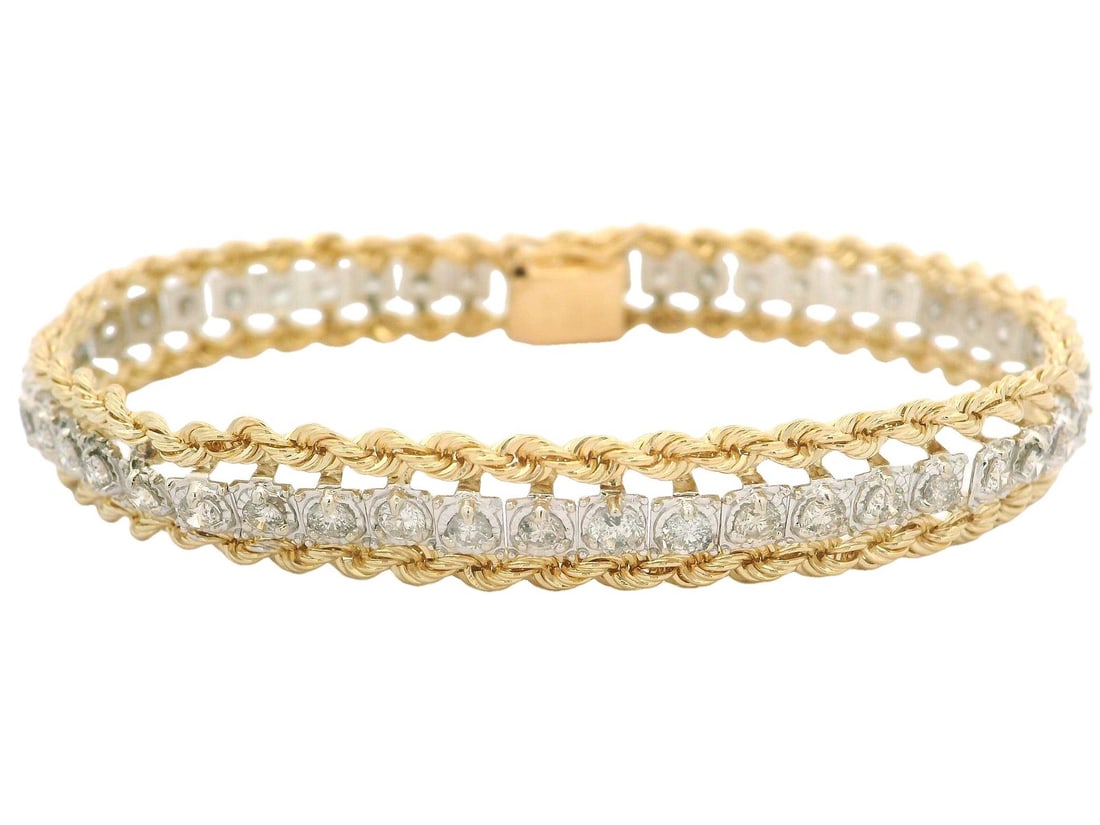 Two Tone Gold Diamond Rope Link Bracelet 2.50ctw Natural Diamonds: Two Tone Gold Diamond Rope Link Bracelet 2.50ctw Natural Diamonds This exquisite Two Tone Gold Dual Rope Link Bracelet features a stunning diamond center line, comprising 49 natural genuine round bril