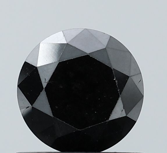 Loose Diamond - ROUND 0.88ct Fancy Black VS1: Loose Diamond - ROUND 0.88ct Fancy Black VS1 Source: Natural Shape: ROUND Carats: 0.88 Color: Fancy Black Certification: NONE Video: