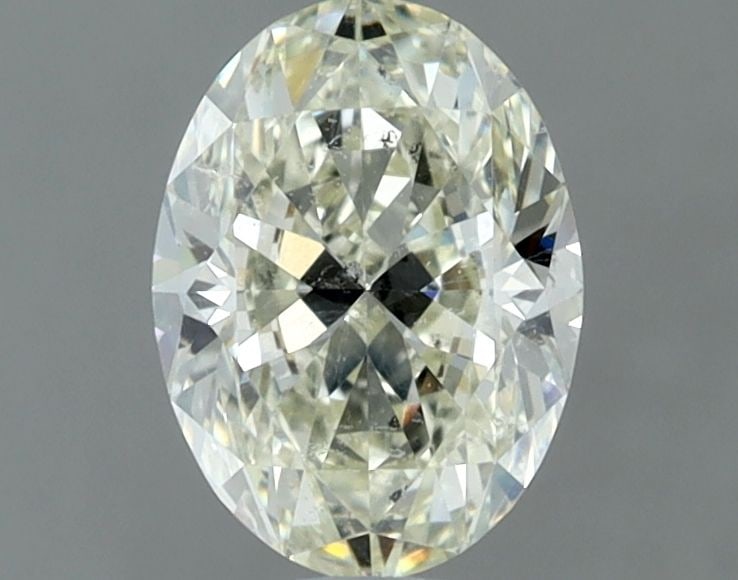 Loose Diamond - OVAL 1.0ct K SI2: Loose Diamond - OVAL 1.0ct K SI2 Source: Natural Shape: OVAL Carats: 1.0 Color: K Clarity: SI2 Certification: IGI The Diamond Depot Guarantee: All items in this auction are guaranteed to be 100% authe