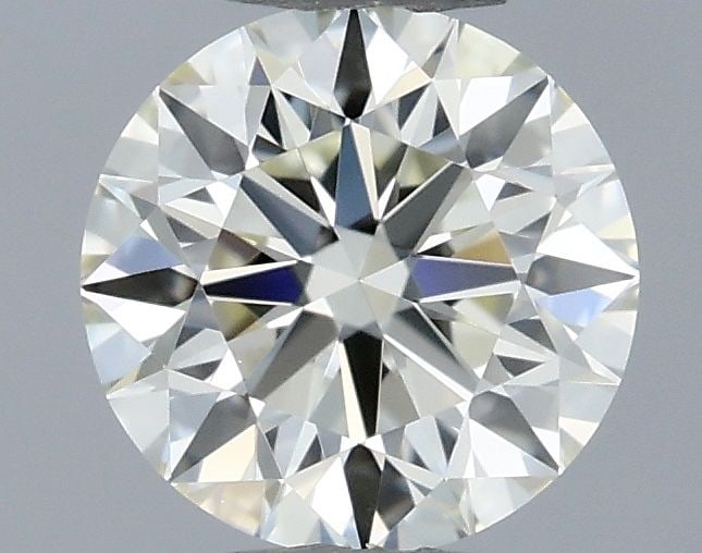 Loose Diamond - ROUND 0.3ct N VVS2: Loose Diamond - ROUND 0.3ct N VVS2 Source: Natural Shape: ROUND Carats: 0.3 Color: N Clarity: VVS2 Certification: GIA The Diamond Depot Guarantee: All items in this auction are guaranteed to be 100% a