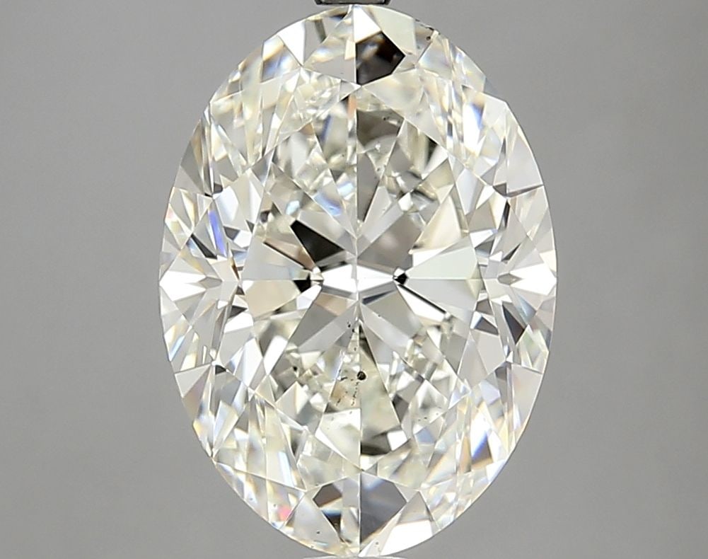 Loose Diamond - OVAL 5.02ct K SI1: Loose Diamond - OVAL 5.02ct K SI1 Source: Natural Shape: OVAL Carats: 5.02 Color: K Clarity: SI1 Certification: GIA The Diamond Depot Guarantee: All items in this auction are guaranteed to be 100% aut