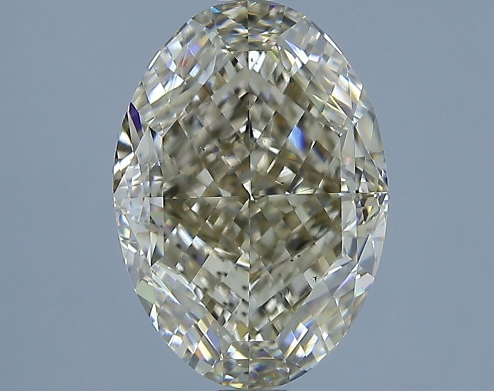 Loose Diamond - OVAL 3.01ct Fancy Light Yellowish Brown VS2: Loose Diamond - OVAL 3.01ct Fancy Light Yellowish Brown VS2 Source: Natural Shape: OVAL Carats: 3.01 Color: Fancy Light Yellowish Brown Certification: NONE The Diamond Depot Guarantee: All items in th
