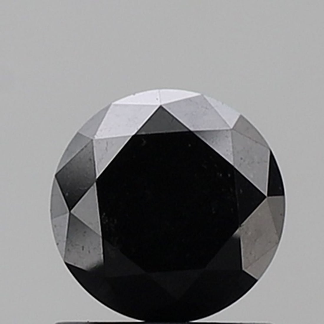 Loose Diamond - ROUND 1.22ct Fancy Black VS2: Loose Diamond - ROUND 1.22ct Fancy Black VS2 Source: Natural Shape: ROUND Carats: 1.22 Color: Fancy Black Certification: NONE Video: