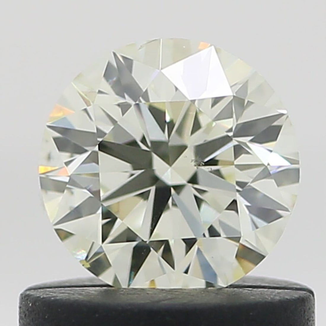 Loose Diamond - ROUND 0.55ct O-P SI1: Loose Diamond - ROUND 0.55ct O-P SI1 Source: Natural Shape: ROUND Carats: 0.55 Color: O-P Certification: NONE Video: