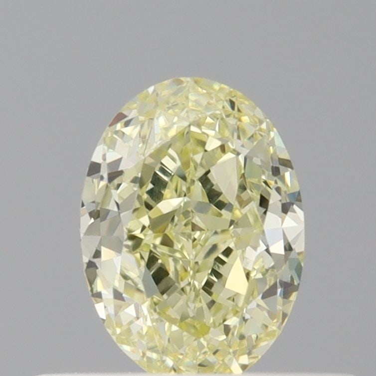 Loose Diamond - OVAL 0.52ct Fancy Light Yellow VS1: Loose Diamond - OVAL 0.52ct Fancy Light Yellow VS1 Source: Natural Shape: OVAL Carats: 0.52 Color: Fancy Light Yellow Certification: GIA The Diamond Depot Guarantee: All items in this auction are guar