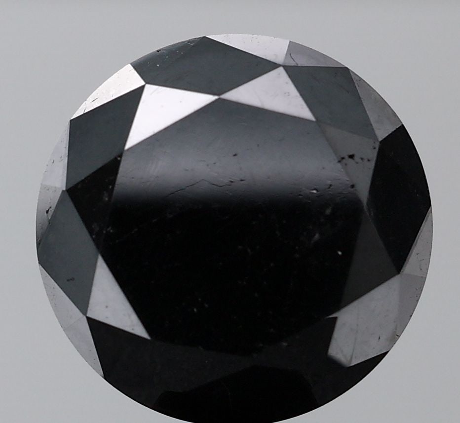 Loose Diamond - ROUND 9.62ct Black SI1: Loose Diamond - ROUND 9.62ct Black SI1 Source: Natural Shape: ROUND Carats: 9.62 Color: Black Certification: NONE Video: