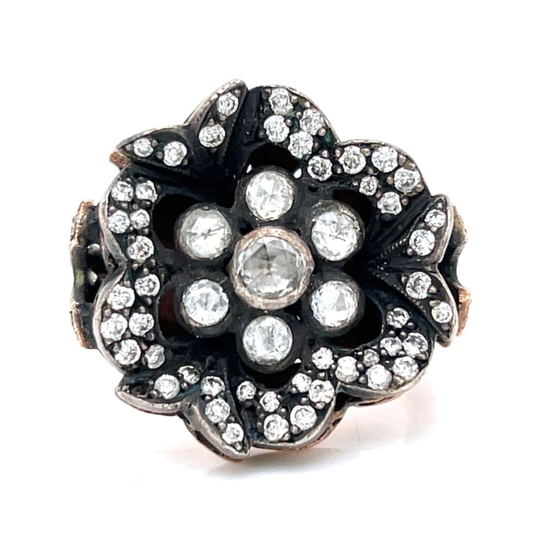 Diamond Ring in 14K Rose Gold and Silver with Rose Cut and Round Stones: Diamond Ring in 14K Rose Gold and Silver with Rose Cut and Round Stones This elegant ring features a combination of 14K rose gold and silver, set with seven rose-cut diamonds totaling approximately 0.