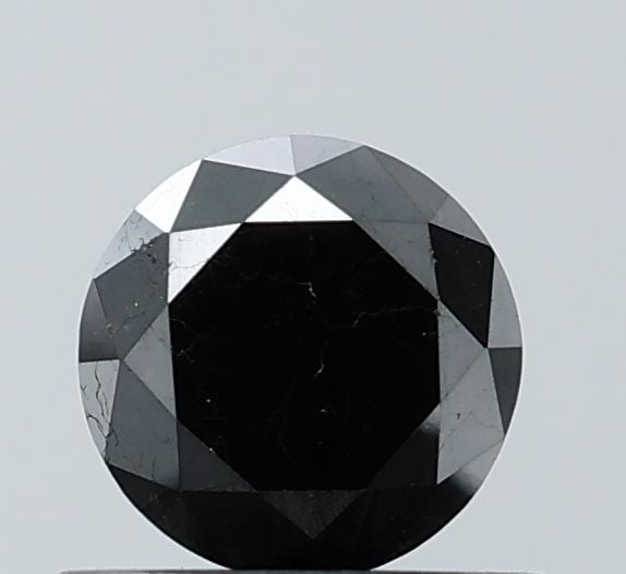 Loose Diamond - ROUND 0.66ct Black VS2: Loose Diamond - ROUND 0.66ct Black VS2 Source: Natural Shape: ROUND Carats: 0.66 Color: Black Certification: NONE Video: